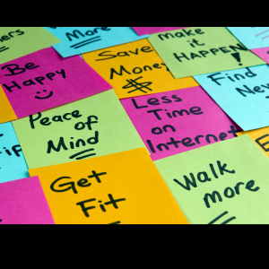 Many Sticky Notes piles with things to do. Ex. Get Fit, Walk more, save money